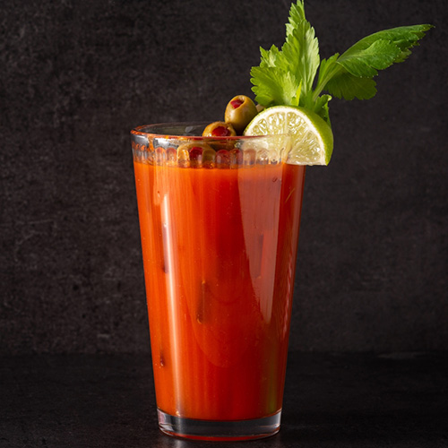 A Bloody Phantom garnished with olives, celery and lime