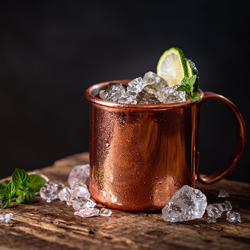 A Phantom Mule in a copper mug with ice and lime